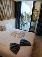 Postel nebo postele na pokoji v ubytování Pyramid Front Hotel