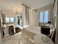A bed or beds in a room at Your Studio Apartment in Sirmione