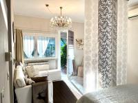 A bed or beds in a room at Your Studio Apartment in Sirmione
