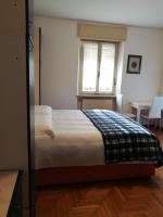 A bed or beds in a room at Falco Bianco