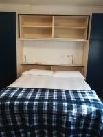 A bed or beds in a room at Falco Bianco