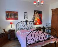 Posteľ alebo postele v izbe v ubytovaní Maison cosy dans village historique