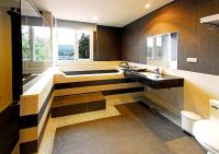 a bathroom with a sink and a bath tub at Sun Moon Lake Karuizawa Villa in Yuchi
