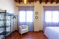Łóżko lub łóżka w pokoju w obiekcie vll Vivienda rural a las puertas de Doñana