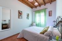 Łóżko lub łóżka w pokoju w obiekcie vll Vivienda rural a las puertas de Doñana