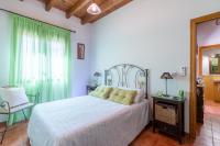 Łóżko lub łóżka w pokoju w obiekcie vll Vivienda rural a las puertas de Doñana