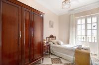 A bed or beds in a room at Casa Macarena