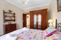 A bed or beds in a room at Casa Macarena