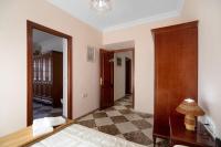 A bed or beds in a room at Casa Macarena