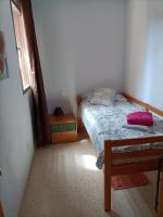 A bed or beds in a room at Las Palmas - Hasta 6 Personas