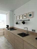 Kuchyňa alebo kuchynka v ubytovaní Moderno y completo apartamento frente al mar