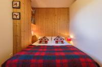 Posteľ alebo postele v izbe v ubytovaní Petit Chalet Des Moussoux - Happy Rentals