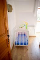 Łóżko lub łóżka w pokoju w obiekcie Suite Familiale 2 chambres double