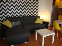 A seating area at Viktória Beach Apartman Gold 1. Siófok