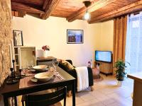 Televízia a/alebo spoločenská miestnosť v ubytovaní Le petit Châtaignier - Cozy Immo