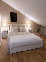 Posteľ alebo postele v izbe v ubytovaní Le petit Châtaignier - Cozy Immo