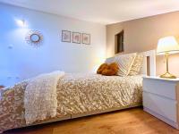 Posteľ alebo postele v izbe v ubytovaní Le petit Châtaignier - Cozy Immo