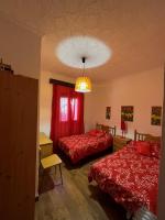 Postel nebo postele na pokoji v ubytování Casa Bimba