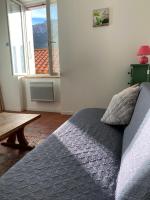 Łóżko lub łóżka w pokoju w obiekcie La Tomette - Le charme de l'authentique