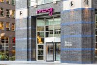 a msg sign on the side of a building at Moxy The Hague in The Hague
