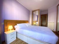 Postel nebo postele na pokoji v ubytování La Magdalena, acogedor apartamento en Villaviciosa