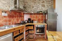 Kuchyňa alebo kuchynka v ubytovaní La Belle Agapanthe-Iris - Maison de ville à Limoges