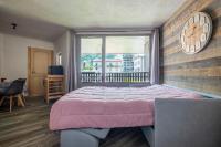 Posteľ alebo postele v izbe v ubytovaní Superbe appartement avec parking gratuit en centre ville et aux pieds des pistes