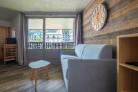 Posedenie v ubytovaní Superbe appartement avec parking gratuit en centre ville et aux pieds des pistes