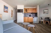 Kuchyňa alebo kuchynka v ubytovaní Superbe appartement avec parking gratuit en centre ville et aux pieds des pistes