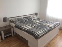A bed or beds in a room at Vienna Belvedere und Hauptbahnhof Apartment