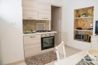 A kitchen or kitchenette at Casa Vacanze Nike