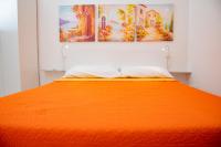 A bed or beds in a room at Casa Vacanze Nike
