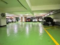 a parking garage filled with lots of parked cars at Wenpin Hotel - Pier 2 in Kaohsiung