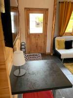 Posteľ alebo postele v izbe v ubytovaní Chalet 2 personnes avec jacuzzi et piscine saisonnière partagée