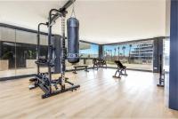 Fitness centrum a/nebo fitness zařízení v ubytování Luxury complex beachfront apartment, infinity pool, sauna, gym and large terrace