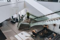 an overhead view of a lobby with a staircase at Courtyard by Marriott Stockholm Kungsholmen in Stockholm
