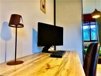 TV a/nebo společenská místnost v ubytování Appartamento nel cuore dell'Appennino Tosco-Emiliano