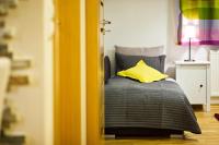 Posteľ alebo postele v izbe v ubytovaní Zakopane Apartamenty LUX