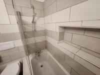 Łazienka w obiekcie Spacieux 2 chambres, paisible