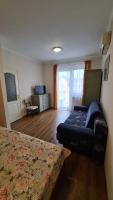 A television and/or entertainment centre at Gabi Apartman