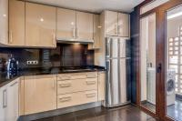 A kitchen or kitchenette at Hanami Bahia de la Plata Penthouse BDLP10A2A