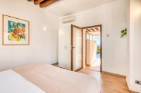 A bed or beds in a room at Hanami Bahia de la Plata Penthouse BDLP10A2A