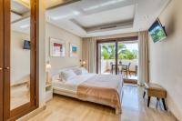 A bed or beds in a room at Hanami Bahia de la Plata Penthouse BDLP10A2A