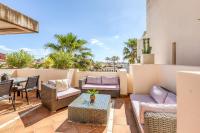A seating area at Hanami Bahia de la Plata Penthouse BDLP10A2A