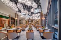 En restaurant eller et andet spisested på Metropolitan Residence