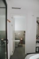 Postel nebo postele na pokoji v ubytování Suites House Denia