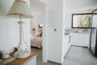 Kuchyň nebo kuchyňský kout v ubytování Suites House Denia