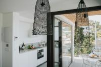 Kuchyň nebo kuchyňský kout v ubytování Suites House Denia