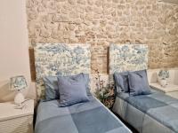 A seating area at Casa Adua by TraMonti Apartments