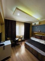 Postel nebo postele na pokoji v ubytování Meta Hotel